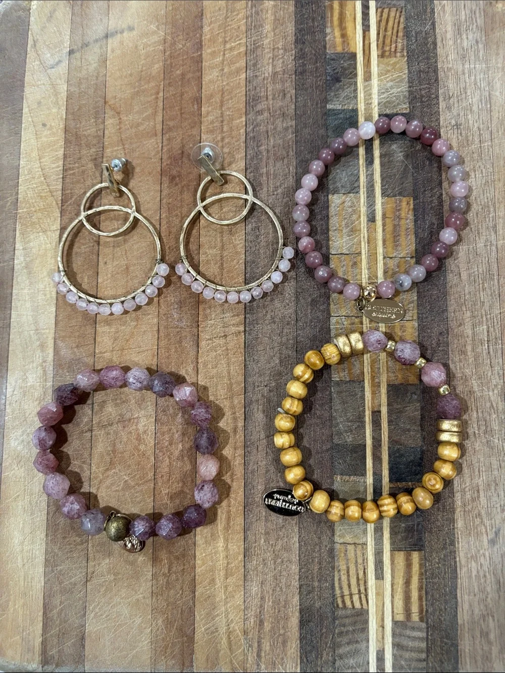 (3) beaded bracelets and (1) pair earrings